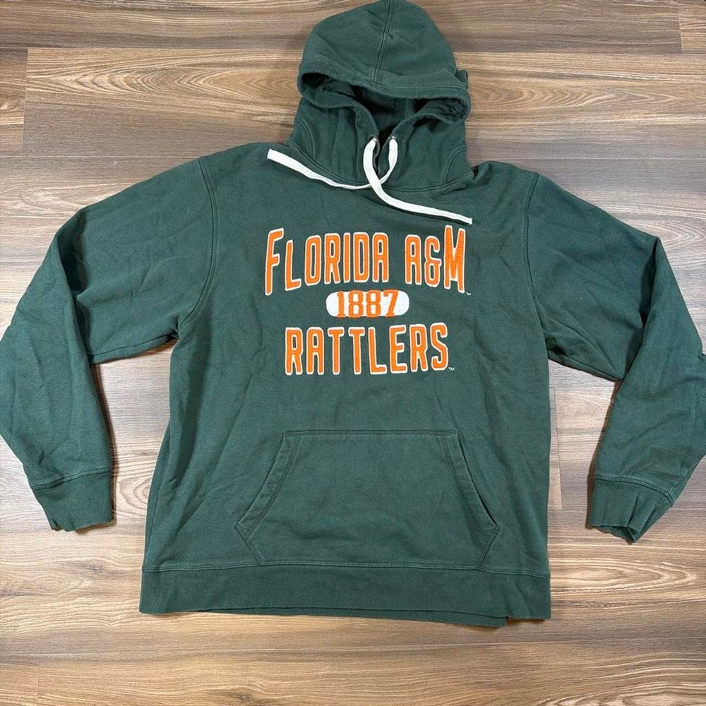 Green Florida A&M Rattlers hoodie with orange text reading 'FLORIDA A&M 1887